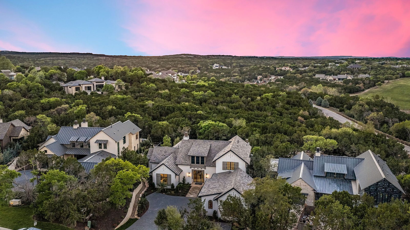 Aerial of an Amarra Cottages home with pool and landscaping